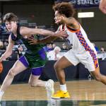 Edmonds-Woodways DJ Karl takes the ball down the court during the 3A boys championship game against Rainier Beach on Saturday, March 8, 2025 in Tacoma, Washington. (Olivia Vanni / The Herald)