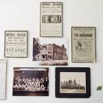 Scans of historical Marysville Opera House flyers hang on a wall on Sept. 16, 2025 in Marysville, Washington. (Olivia Vanni / The Herald)
