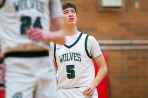 Jackson’s Joey Gosline reacts to the score during the game against Squalicum on Friday, Dec. 27, 2024 in Mountlake Terrace, Washington. (Olivia Vanni / The Herald)