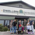 PHOTOS BY Olivia Vanni / The Herald
Dwellers Drinkery co-owners and family outside of their business on Sept. 25 in Lake Stevens.