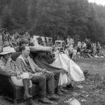 Attendees watch The Sky River Rock Festival on a couch they brought themselves on Sept. 1, 1968 in Sultan, WA.