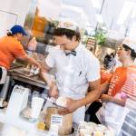 Dicks Drive-In employee Cole Roberts scoops ice cream for milkshakes in preparation of the grand opening on June 12, 2025 in Everett. (Olivia Vanni / The Herald)
