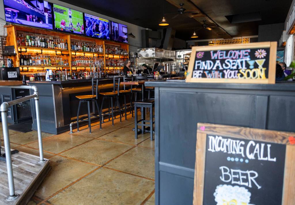 The bar and dining area inside the Flying Pig on Monday, Dec. 29, 2025 in Everett, Washington. (Olivia Vanni / The Herald)
