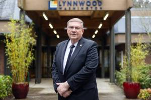 The newly elected Mayor of Lynnwood George Hurst outside of Lynnwood City Hall on Friday, Jan. 2, 2026. (Olivia Vanni / The Herald)