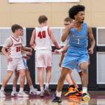 Meadowdales Noah Million reacts after making a three point shot during the game against Snohomish on Monday, Jan. 5, 2026 in Snohomish, Washington. (Olivia Vanni / The Herald)