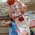 Snohomishs Hudson Smith makes a layup during the game against Meadowdale on Monday, Jan. 5, 2026 in Snohomish, Washington. (Olivia Vanni / The Herald)