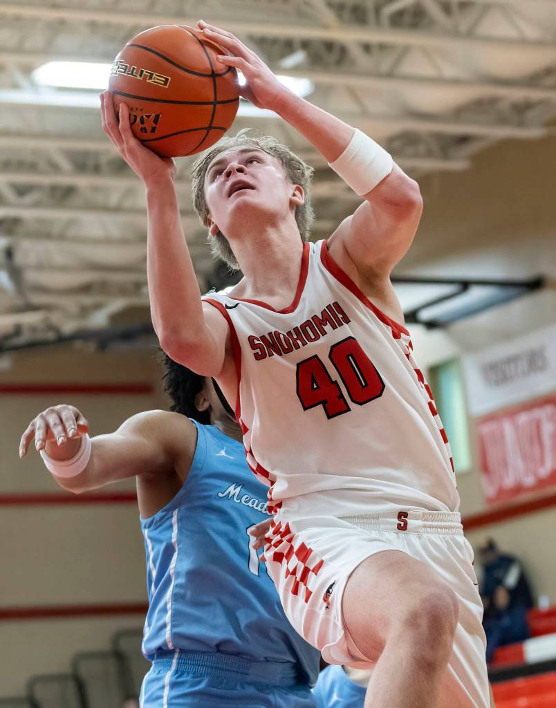 Snohomishs Hudson Smith makes a layup during the game against Meadowdale on Monday, Jan. 5, 2026 in Snohomish, Washington. (Olivia Vanni / The Herald)