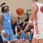 Meadowdales Hasaan Motley looks at the scoreboard during the game against Snohomish on Monday, Jan. 5, 2026 in Snohomish, Washington. (Olivia Vanni / The Herald)