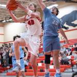 Snohomishs Hudson Smith makes a shot while Meadowdales Marley Miller defends during the game on Monday, Jan. 5, 2026 in Snohomish, Washington. (Olivia Vanni / The Herald)