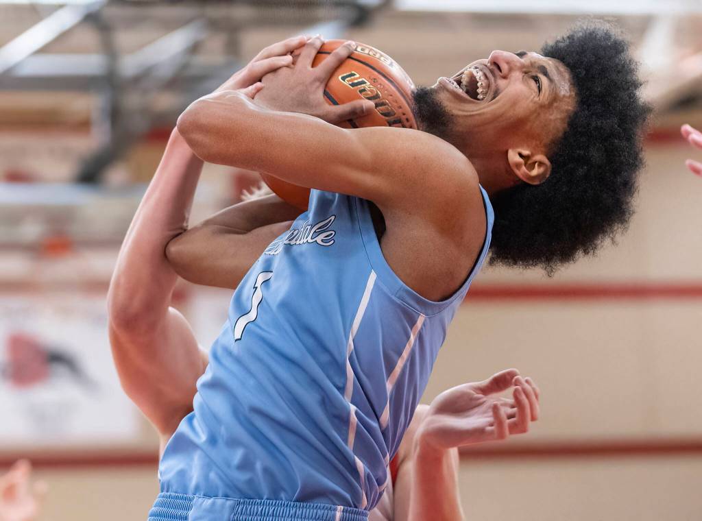 Meadowdales Noah Million yells as he gets fouled during the game against Snohomish on Monday, Jan. 5, 2026 in Snohomish, Washington. (Olivia Vanni / The Herald)