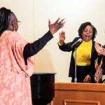 Holley Lacy, left, leads the MLK Celebration Ensemble with Sandra Wright, center, and Maria Caycedo during the Community Celebration for Rev. Dr. Martin Luther King, Jr. Day of Service in 2022 at the First Presbyterian Church in Everett. (Kevin Clark / The Herald)