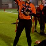 Monroe senior Katelyn Cockrum poses with the Monroe girls flag football teams Turnover Chain after grabbing an interception in the Bearcats 28-14 win against Squalicum at Everett Memorial Stadium on Jan. 7, 2026. (Joe Pohoryles / The Herald)
