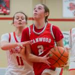 Stanwood's Ellalee Wortham tries to get around Snohomish’s Lizzie Allyn to make a shot during the game on Thursday, Jan. 9, 2025 in Snohomish, Washington. (Olivia Vanni / The Herald)