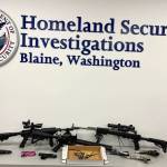 Firearms, located after investigators searched the residences and vehicles of suspects connected to a drug trafficking conspiracy, were displayed in the Homeland Security Investigations office in Blaine, Washington. (Provided Photo)