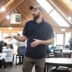 Tyler Verda talks before the Disaster Assistance Center opens on Wednesday, Jan. 14, 2026 in Sultan, Washington. (Olivia Vanni / The Herald)