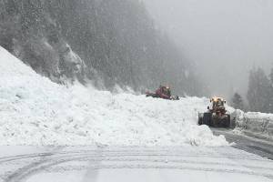 Washington State Department of Transportation avalanche technicians assess a slide on Hwy. 20 near Liberty Bell Mountain. (WSDOT photo)