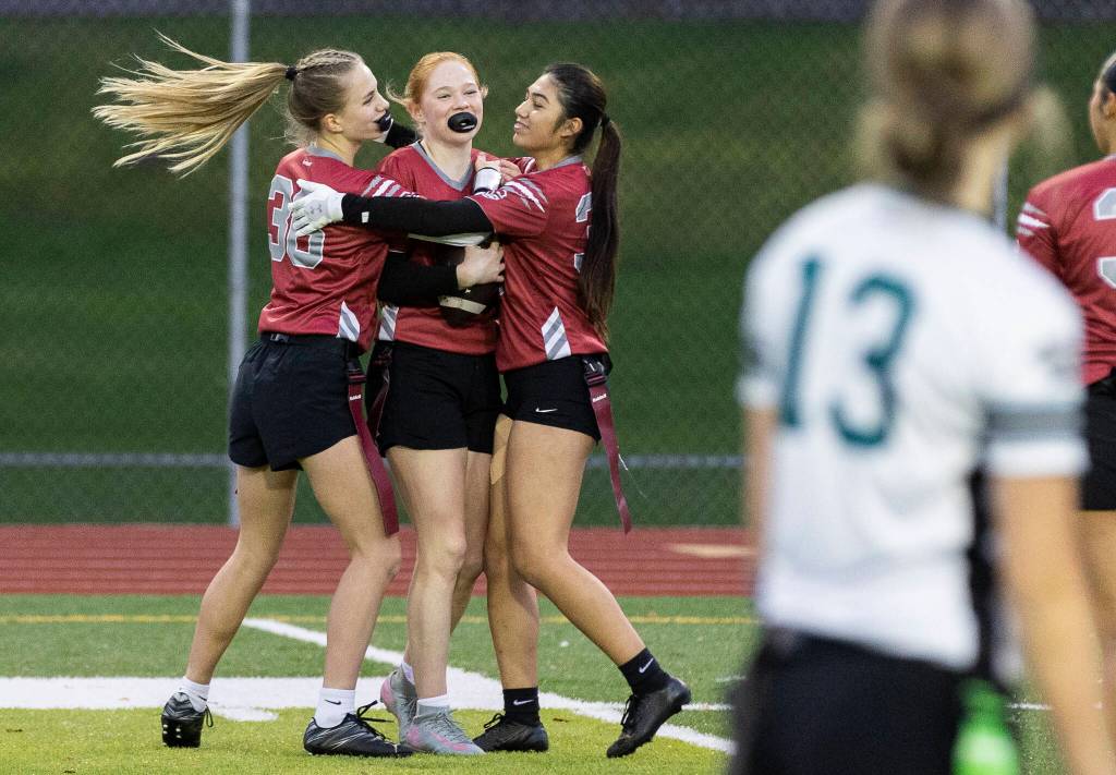 Cascades Caylee Krestel celebrates after scoring a touchdown against Jackson during the game on Wednesday, Jan. 14, 2026 in Everett, Washington. (Olivia Vanni / The Herald)