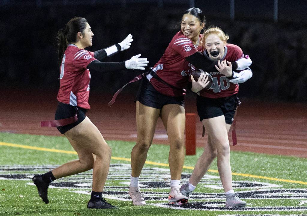 Cascades Caylee Krestel celebrates scoring a touchdown against Jackson during the game on Wednesday, Jan. 14, 2026 in Everett, Washington. (Olivia Vanni / The Herald)