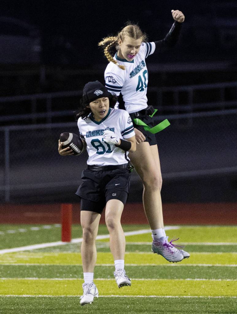 Jacksons Erica Yong celebrates scoring a touchdown against Cascade during the game on Wednesday, Jan. 14, 2026 in Everett, Washington. (Olivia Vanni / The Herald)