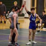 Meadowdales Chris Ramirez (right) is signaled as the winner of the 144-pound match against Shorecrests Neta Navot in the Mavericks 43-34 win against the Scots at Shorecrest High School on Jan. 15, 2026. (Joe Pohoryles / The Herald)