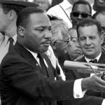FILE - In this Aug. 28, 1963 file photo, the Rev. Dr. Martin Luther King Jr., head of the Southern Christian Leadership Conference, speaks to thousands during his "I Have a Dream" speech in front of the Lincoln Memorial for the March on Washington for Jobs and Freedom, in Washington. A new documentary “MLK/FBI,” shows how FBI director J. Edgar Hoover used the full force of his federal law enforcement agency to attack King and his progressive, nonviolent cause. That included wiretaps, blackmail and informers, trying to find dirt on King. (AP Photo/File)