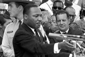 FILE - In this Aug. 28, 1963 file photo, the Rev. Dr. Martin Luther King Jr., head of the Southern Christian Leadership Conference, speaks to thousands during his "I Have a Dream" speech in front of the Lincoln Memorial for the March on Washington for Jobs and Freedom, in Washington. A new documentary “MLK/FBI,” shows how FBI director J. Edgar Hoover used the full force of his federal law enforcement agency to attack King and his progressive, nonviolent cause. That included wiretaps, blackmail and informers, trying to find dirt on King. (AP Photo/File)