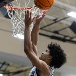 Glacier Peaks Justin Vinson makes a layup during the game against Arlington on Friday, Jan. 16, 2026 in Snohomish, Washington. (Olivia Vanni / The Herald)