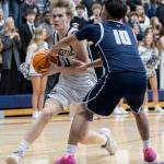 Glacier Peaks Reed Nagel drives to the hoop against Arlingtons Jordan Cardona during the game on Friday, Jan. 16, 2026 in Snohomish, Washington. (Olivia Vanni / The Herald)