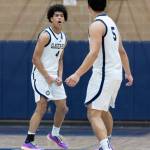 Glacier Peaks Justin Vinson reacts after making a three point basket during the game against Arlington on Friday, Jan. 16, 2026 in Snohomish, Washington. (Olivia Vanni / The Herald)