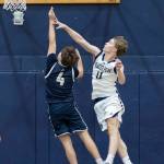 Glacier Peaks Reed Nagel blocks a shot by Arlingtons Maveric Vaden during the game on Friday, Jan. 16, 2026 in Snohomish, Washington. (Olivia Vanni / The Herald)