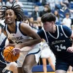 Glacier Peaks Paulos Mulugeta controls the ball against Arlingtons Hudson Miller during the game on Friday, Jan. 16, 2026 in Snohomish, Washington. (Olivia Vanni / The Herald)