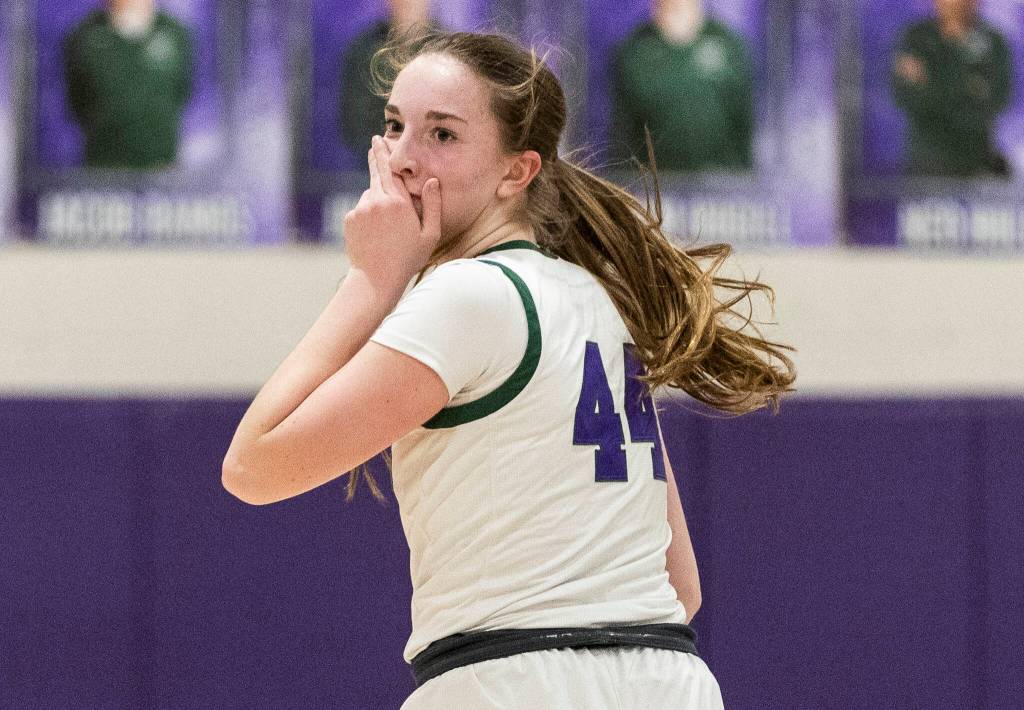 Edmonds-Woodways Amelia Faber reacts to making a three-point shot during the game against Archbishop Murphy on Tuesday, Jan. 20, 2026 in Edmonds, Washington. (Olivia Vanni / The Herald)