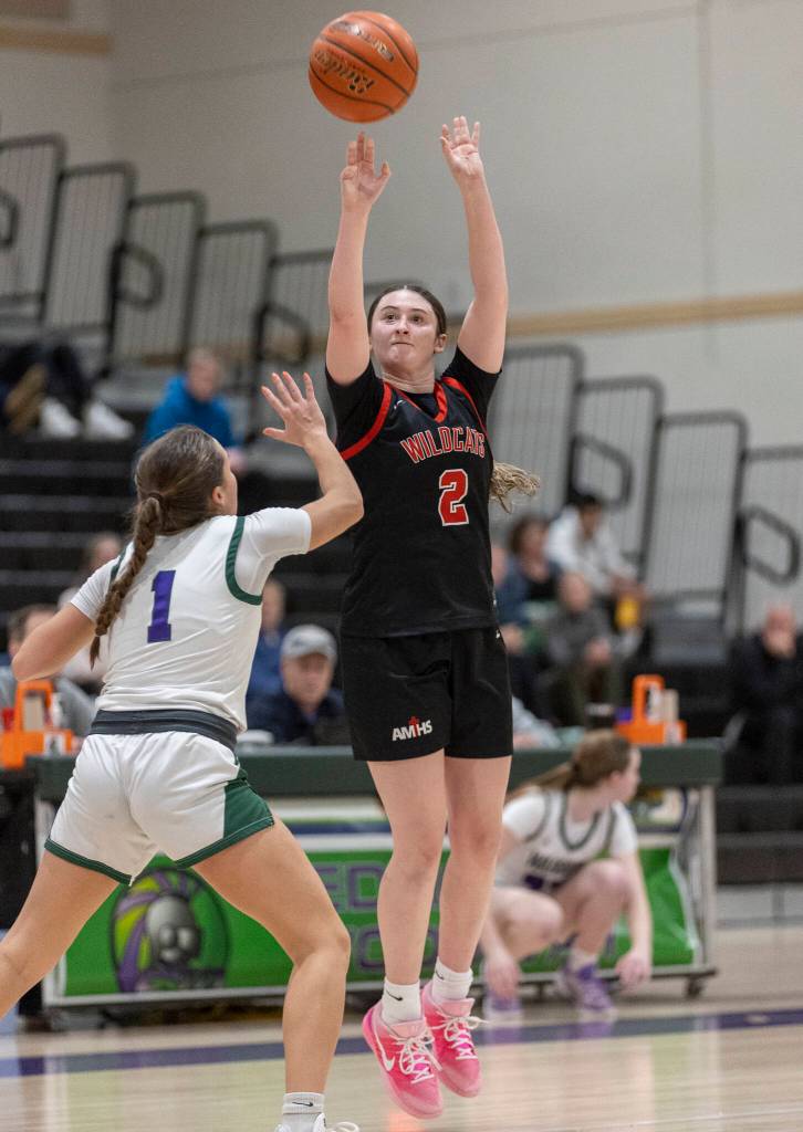 Archbishop Murphys Brooke Blachly takes a three-point shot during the game against Edmonds-Woodway on Tuesday, Jan. 20, 2026 in Edmonds, Washington. (Olivia Vanni / The Herald)