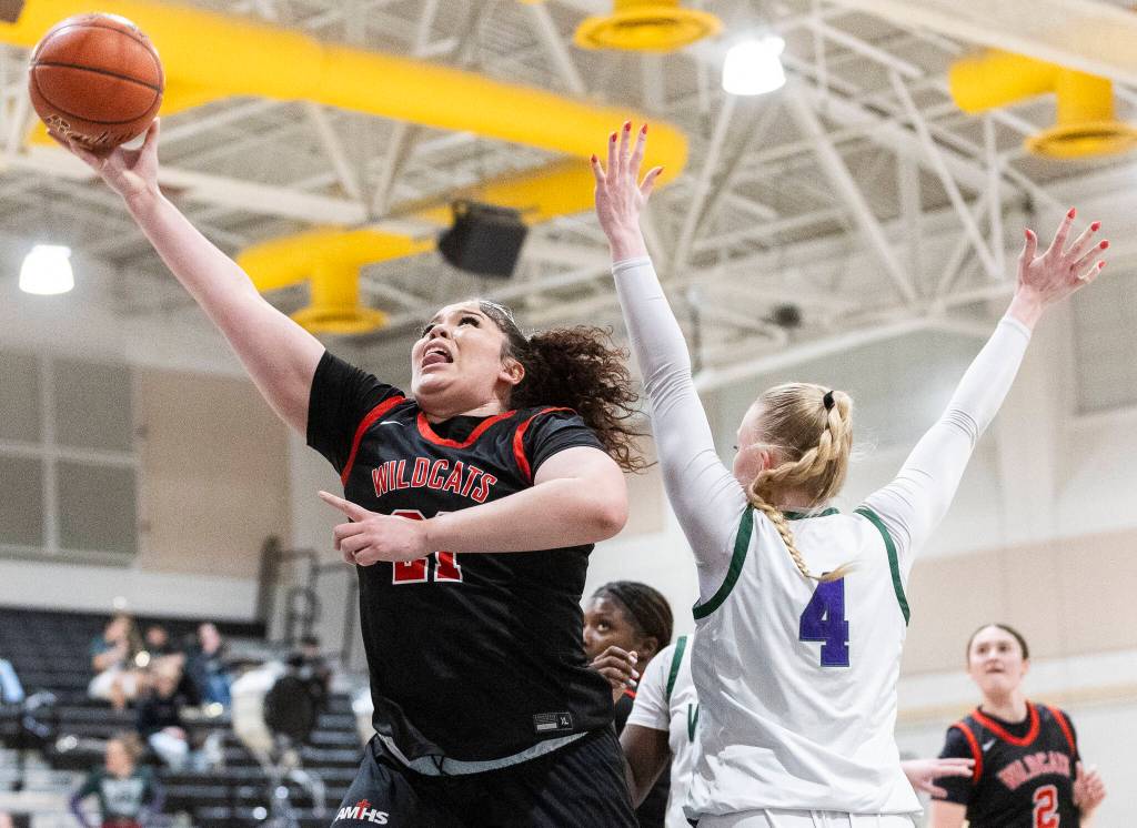 Archbishop Murphys Celine Wright makes a layup during the game against Edmonds-Woodway on Tuesday, Jan. 20, 2026 in Edmonds, Washington. (Olivia Vanni / The Herald)