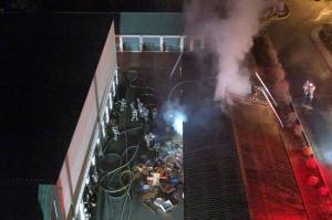 Firefighters discovered heavy smoke emerging from multiple units in the single-story complex, making it difficult to identify the location of the fire. (South County Fire)