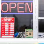 A Health Department scannable QR code is visible in the window of Taqueria El Coyotes food truck on Thursday, Jan. 29, 2026 in Lynnwood, Washington. (Olivia Vanni / The Herald)