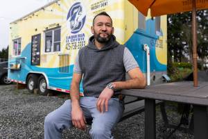 Carlos Cerrato, owner of Taqueria El Coyote, outside of his food truck on Thursday, Jan. 29, 2026 in Lynnwood. (Olivia Vanni / The Herald)