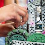 Stickers are visible on the side of a robot on Thursday, Jan. 29, 2026 in Lake Stevens, Washington. (Olivia Vanni / The Herald)