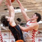 Snohomishs Deyton Wheat blocks a shot by Monroes Isaiah Kiehl during the game on Wednesday, Jan. 28, 2026 in Snohomish, Washington. (Olivia Vanni / The Herald)