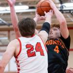Monroes Tate Hammerquist shoots the ball against Snohomishs Luke Davis during the game on Wednesday, Jan. 28, 2026 in Snohomish, Washington. (Olivia Vanni / The Herald)