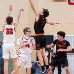 Monroes Caleb Campbell blocks a shot by Snohomishs Jack Rotondo during the game on Wednesday, Jan. 28, 2026 in Snohomish, Washington. (Olivia Vanni / The Herald)