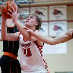 Snohomishs Hudson Smith is fouled during the game against Monroe on Wednesday, Jan. 28, 2026 in Snohomish, Washington. (Olivia Vanni / The Herald)