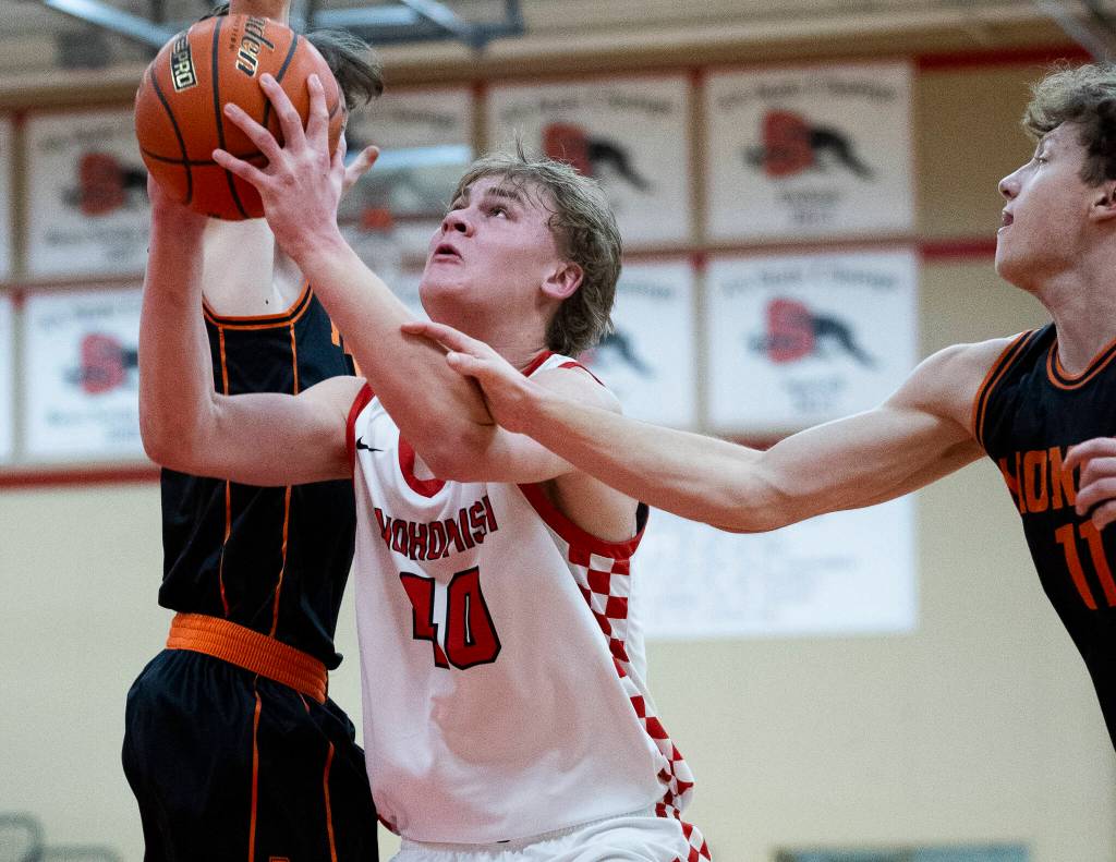 Snohomishs Hudson Smith is fouled during the game against Monroe on Wednesday, Jan. 28, 2026 in Snohomish, Washington. (Olivia Vanni / The Herald)