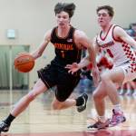 Monroes Caleb Campbell drives to the hoop against Snohomishs Cade Yoder during the game on Wednesday, Jan. 28, 2026 in Snohomish, Washington. (Olivia Vanni / The Herald)