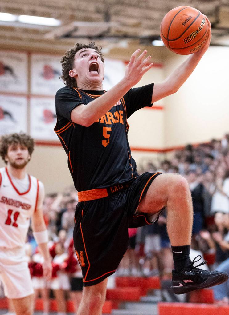 Monroes Liam Reed lays up the ball during the game against Snohomish on Wednesday, Jan. 28, 2026 in Snohomish, Washington. (Olivia Vanni / The Herald)