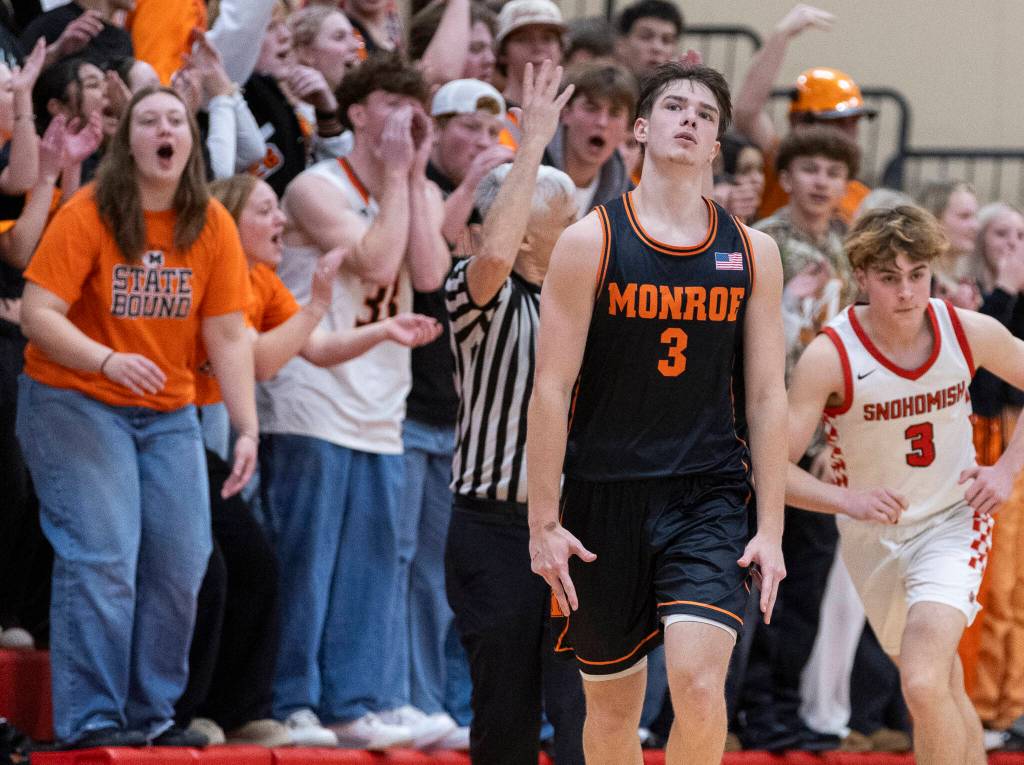 Monroes Isaiah Kiehl reacts after making a three point shot during the game against Snohomish on Wednesday, Jan. 28, 2026 in Snohomish, Washington. (Olivia Vanni / The Herald)