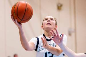Meadowdale’s Lexi Zardis makes a layup during the game against Shorewood on Wednesday, Jan. 22, 2025 in Lynnwood, Washington. (Olivia Vanni / The Herald)