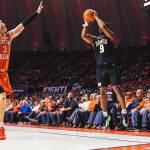 Washingtons Wesley Yates III makes a 3-point shot against No. 9 Illinois at Lou Henson Court in Champaign, Illinois on Thursday. (Photo courtesy of Washington Athletics)