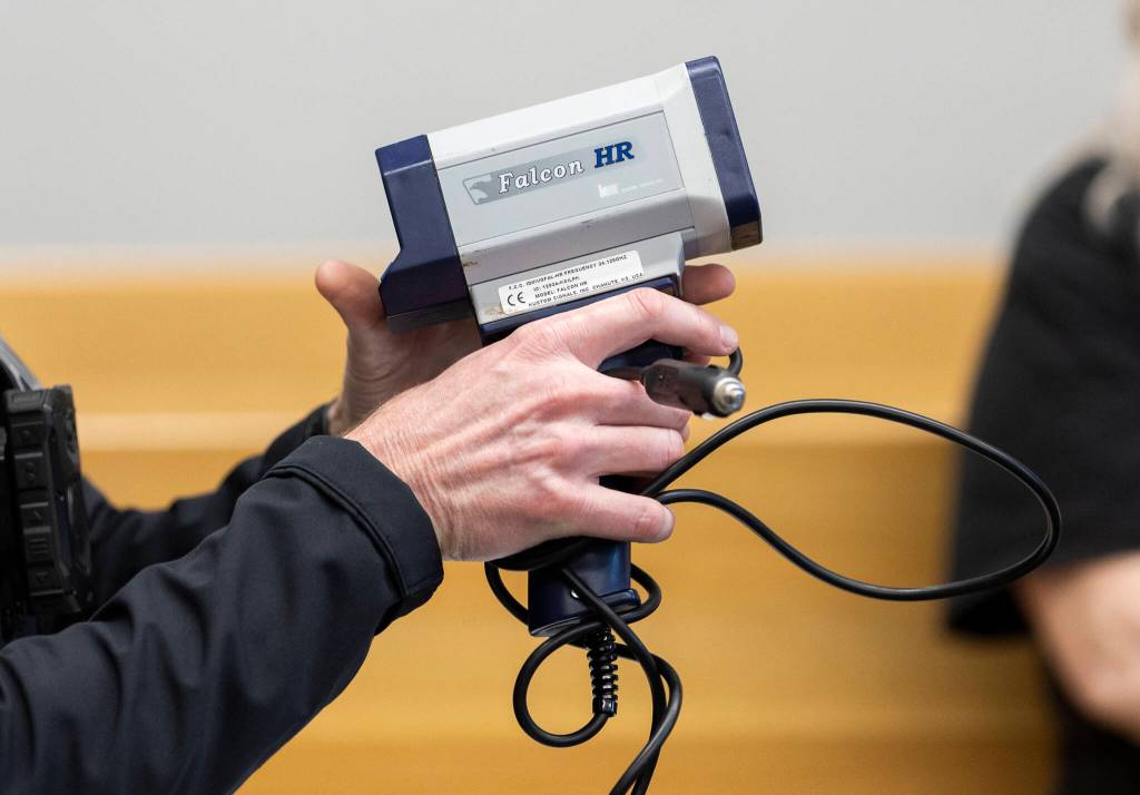 Lake Stevens police officer David Carter shows and example of a speed radar during the Youth Traffic Court session at the Snohomish County Courthouse on Friday, Jan. 30, 2026 in Everett, Washington. (Olivia Vanni / The Herald)