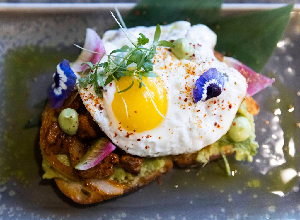 An al pastor and egg avocado toast that is a part of Bar Dojos brunch menu on Wednesday, Jan. 28, 2026 in Edmonds, Washington. (Olivia Vanni / The Herald)